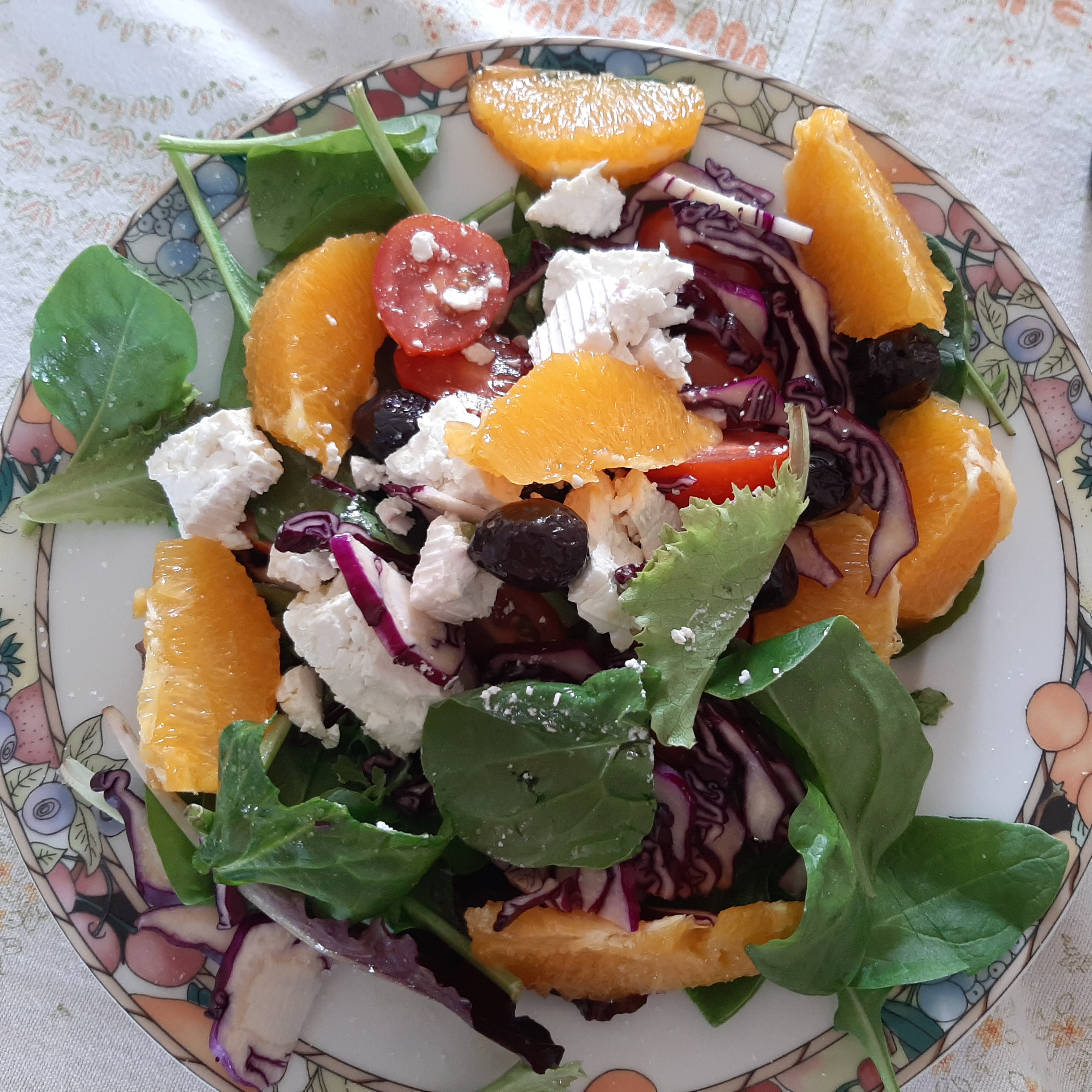 Orange salad with olives and herbs